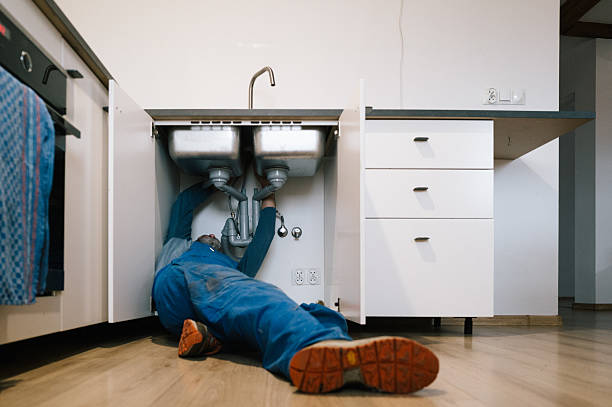 Professional Plumbing technician working in Marriottsville, MD